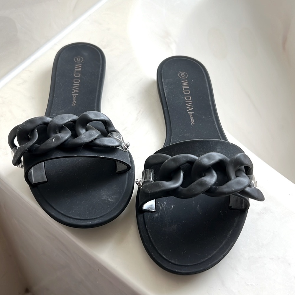Black flat slide sandals
